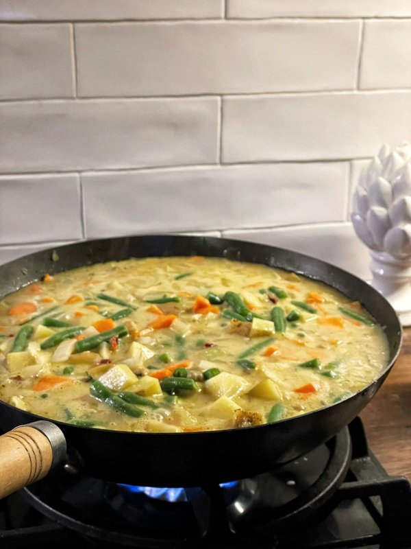 Quelles astuces pour préparer un curry de pois chiches crémeux et savoureux?